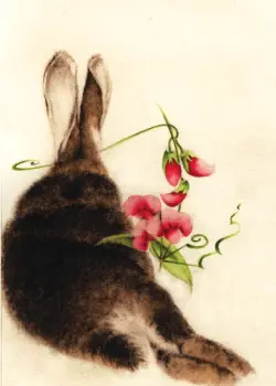 Sweet Pea Flowers with a Brown Bunny Laying Down by Them
