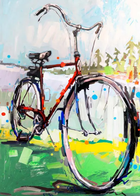 red bike on green grass in front of blue lake and pine trees