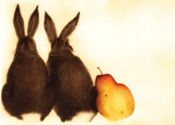 Two Brown Bunnies with an Orange Pear Leaning Against One of them