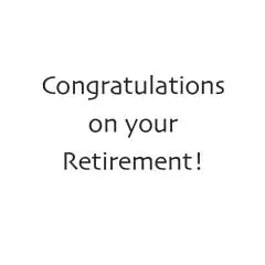 Lakefront scene with dock and chairs around water. Trees in foreground with blue sky behind