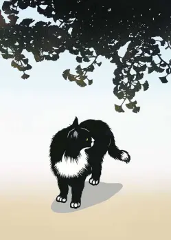 Black and white cat under black tree